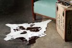 2' X 3' Brown And White Cowhide Abstract Hand Woven Area Rug