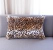 Set of Two 12" X 20" Black And Orange Leopard Throw Pillows