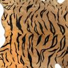 5' X 7' Black And Orange Cowhide Area Rug