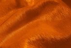 5' X 7' Orange Cowhide Area Rug