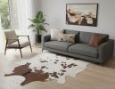 6' X 7' Brown And White Cowhide Area Rug