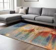 8' X 11' Blue Rust And Orange Abstract Area Rug