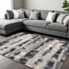 8' X 11' Gray Black And Ivory Abstract Area Rug