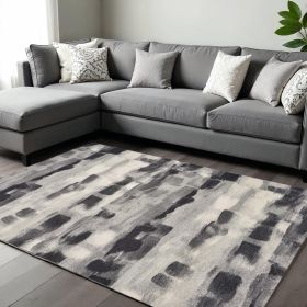 8' X 11' Gray Black And Ivory Abstract Area Rug