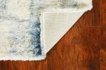 9' X 13' Ivory And Blue Abstract Geometric Area Rug