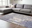 7' X 10' Gray And Ivory Abstract Hand Loomed Area Rug