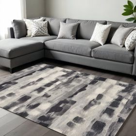 10' X 13' Gray Black And Ivory Abstract Area Rug