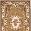 5' X 8' Beige Ivory And Brown Floral Medallion Area Rug