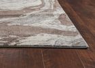 5' X 8' Brown And Ivory Abstract Area Rug