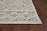 5' X 7' Sand Beige And Ivory Wool Geometric Hand Hooked Area Rug