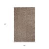 5' X 7' Beige And Brown Abstract Shag Hand Woven Area Rug