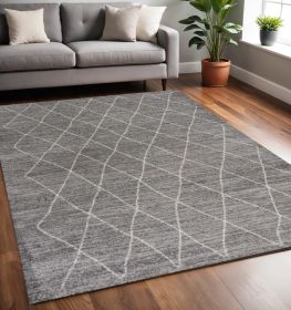 5' X 8' Gray And Ivory Geometric Area Rug