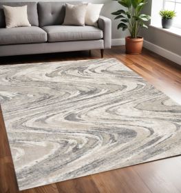 5' X 8' Gray And Tan Abstract Area Rug