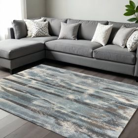 7' X 10' Teal Blue And White Abstract Area Rug
