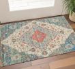 2' X 4' Blue Beige And Brick Red Jute Medallion Hand Woven Distressed Area Rug