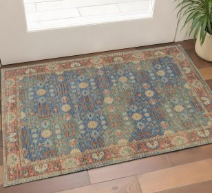 2' X 4' Blue Red And Beige Floral Medallion Hand Woven Distressed Area Rug