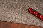2' X 4' Beige And Brown Abstract Shag Hand Woven Area Rug