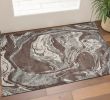 3' X 5' Brown And Ivory Abstract Area Rug
