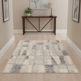 4' X 6' Ivory And Blue Abstract Geometric Distressed Area Rug