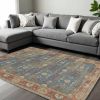7' X 9' Blue Red And Beige Floral Medallion Hand Woven Area Rug