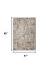 4' X 6' Beige Tan And Gold Abstract Distressed Area Rug