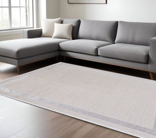 8' X 11' Ivory And Silver Abstract Area Rug