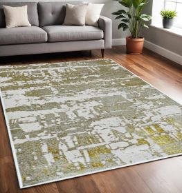 5' X 8' Ivory And Gold Abstract Area Rug