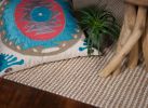 5' X 7' Tan And Ivory Hand Woven Area Rug