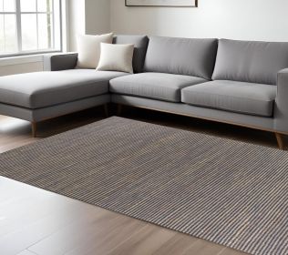 8' X 11' Blue And Beige Abstract Hand Woven Area Rug
