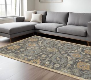 9' X 13' Taupe Orange And Gray Wool Floral Distressed Area Rug