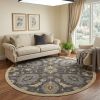 9' Taupe Orange And Gray Wool Floral Distressed Round Rug
