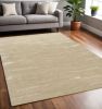 5' X 7' Beige And Ivory Abstract Hand Tufted Area Rug