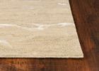 5' X 7' Beige And Ivory Abstract Hand Tufted Area Rug