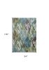 8' X 11' Ivory Blue And Green Tropical Botanical Area Rug