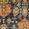 8' X 11' Navy Blue Orange And Brown New Zealand Lambs Wool Medallion Hand Tufted Area Rug