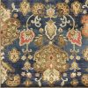 8' X 11' Navy Blue Orange And Brown New Zealand Lambs Wool Medallion Hand Tufted Area Rug