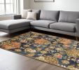 8' X 11' Navy Blue Orange And Brown New Zealand Lambs Wool Medallion Hand Tufted Area Rug