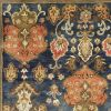 9' X 13' Navy Blue Orange And Brown Wool Medallion Hand Tufted Area Rug
