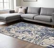 7' X 9' Blue Gray And Ivory Abstract Area Rug