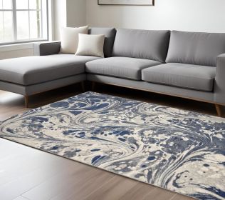 7' X 9' Blue Gray And Ivory Abstract Area Rug
