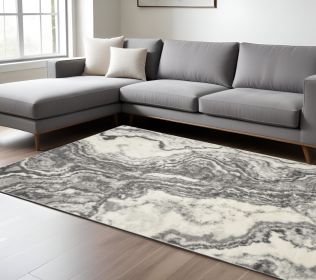 7' X 9' Gray And Ivory Abstract Area Rug