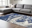 7' X 10' Blue And Beige Abstract Area Rug