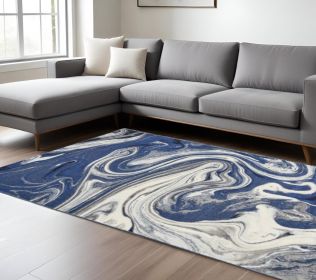 7' X 10' Blue And Beige Abstract Area Rug