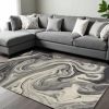 7' X 9' Ivory Black And Gray Abstract Shag Area Rug