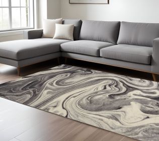 8' X 10' Ivory Black and Gray Abstract Shag Area Rug