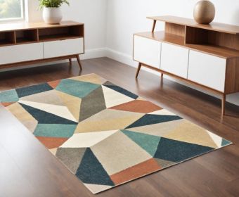 4' X 6' Blue Green And Beige Abstract Geometric Area Rug