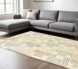6' X 9' Ivory Blue And Red Geometric Area Rug