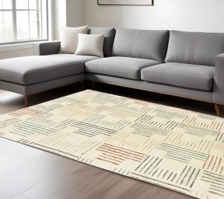6' X 9' Ivory Blue And Red Geometric Area Rug