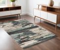 4' X 6' Ivory Blue And Gray Abstract Area Rug
