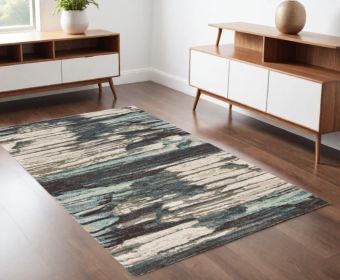 4' X 6' Ivory Blue And Gray Abstract Area Rug